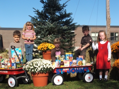 St. John Catholic School Students Help Stock the Shelves of Local Food Bank